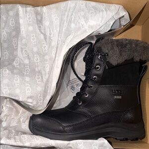 UGG Black Leather Boots with Fur Lining